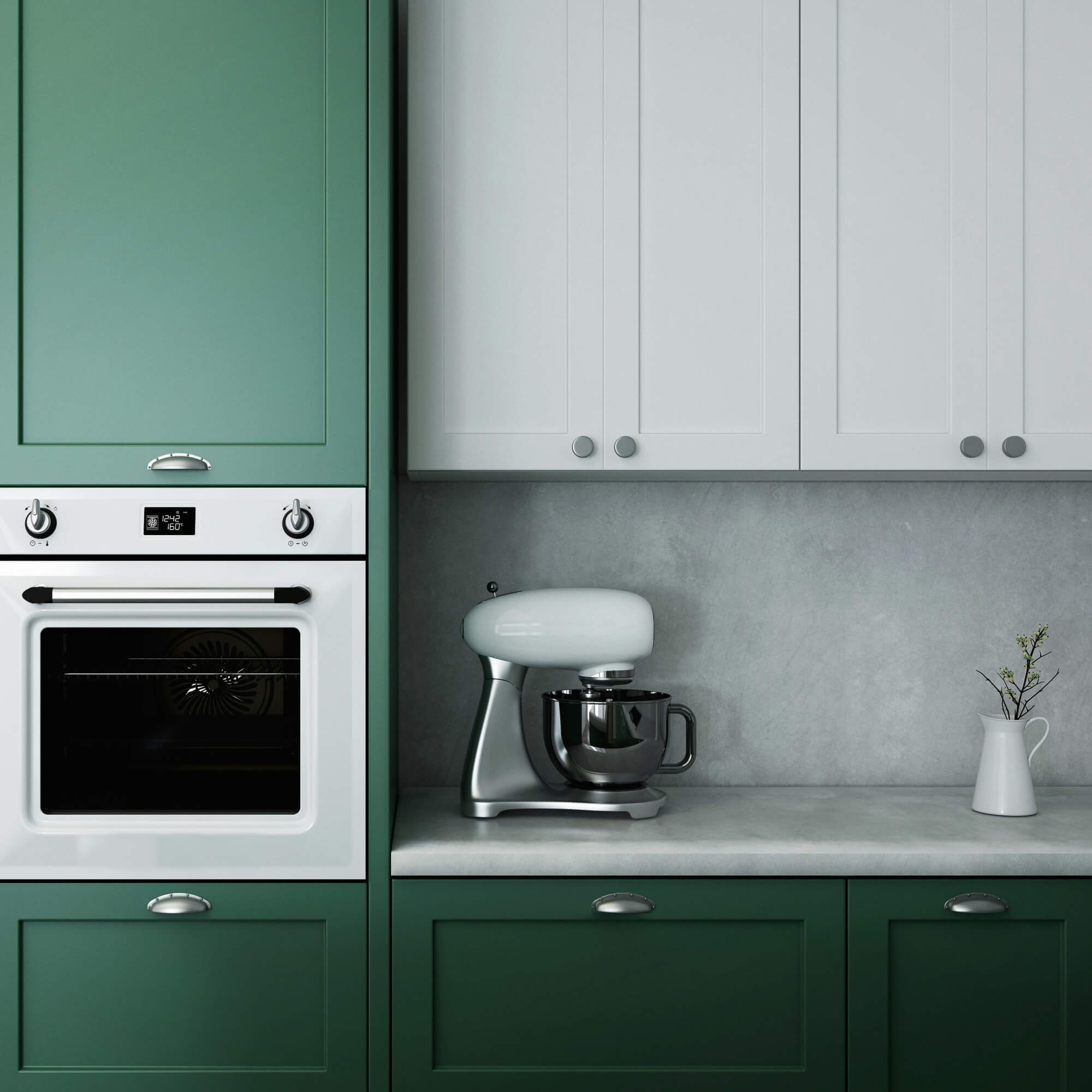 Two-tone kitchen with green and white Shaker cabinets – matte finish and minimalist appliance integration